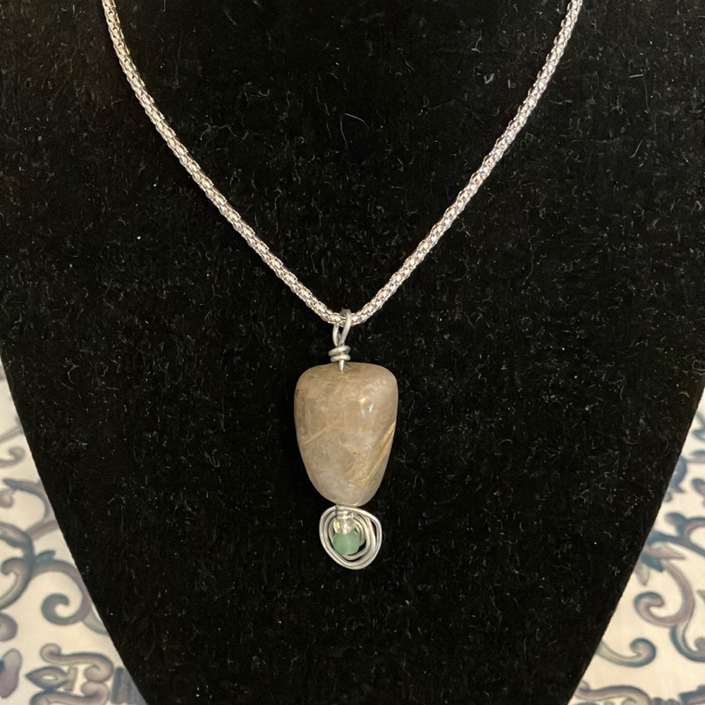 Silver tone and unique Brown Stone Pendant Necklace with Turquoise color bead.